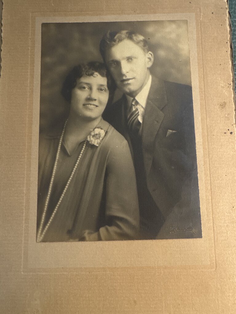 PHOTO OF COUPLE WITH WOMAN IN PEARLS BLK/WHT