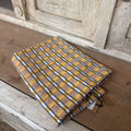 COTTON PRINTED TEA TOWEL BURGUNDY AND GOLD WITH BLACK STRIPE 28" X 17"