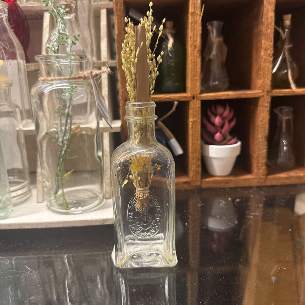 EMBOSSED CLEAR SINGER BOTTLE