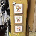 THREE TIER FLORAL PICTURE WITH WOOD FRAME