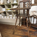 BROWN WOODEN HIGHCHAIR
