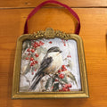 HANGING BIRD PERCHED ON CRANBERRIES
