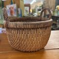SMALL VINTAGE WOVEN BASKET WITH TWISTED HANDLES