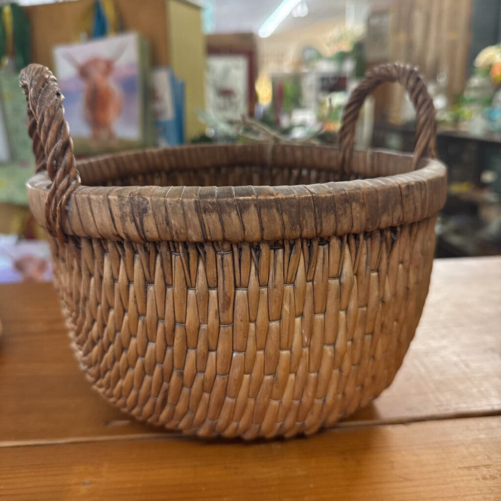 SMALL VINTAGE WOVEN BASKET WITH TWISTED HANDLES